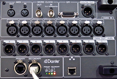 The rear panel has eight assignable Omni inputs/outputs, MIDI word clock, AES digital out and two independent Dante feeds for redundancy.