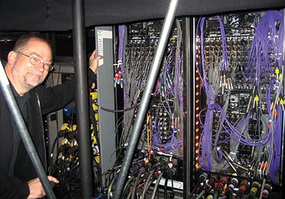 Orchestral mixer Steve Colby checks the inputs into the four DiGiCo SD racks located under the stage. Photo by Matt Larson