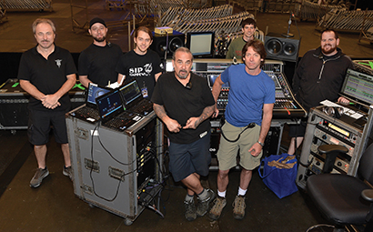 The Bon Jovi audio crew, (L-R): monitor engineer Glen Collett; monitor tech Dustin Ponscheck; P.A. tech Thomas Morris; systems engineer Frank Principato; FOH engineer Bill Sheppell (in front); monitor engineer Andy Hill (in rear); and RF tech Ken “Cubby” McDowell. Tour photo by Steve Jennings