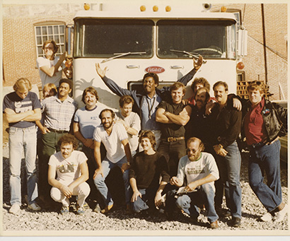 The Springsteen River tour crew with Clarence Clemons (center, arms raised)