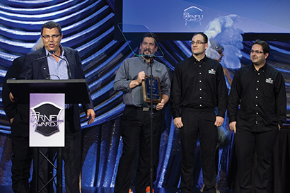 Team Chauvet took the stage for the 2013 Indispensable Technology award in the Lighting category for their company's Nexus 4x4 fixture. Pictured here, from left, are Albert Chauvet along with product managers Michael Graham, Anthony Chiappone and product engineer Danilo Oliveira. Photo by Adam Kaplan