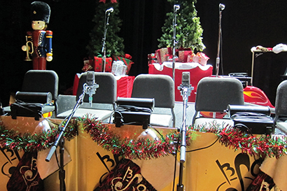 A pair of AKG C-414’s (plus soloist clip-on mics) covers the sax section. Photo by John Jennings