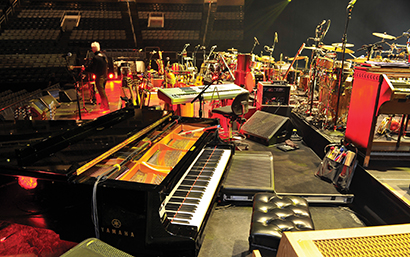 View from stage left with the Yamaha grand piano in the foreground with Earthworks PM40 PianoMic and plenty of Clair Wedge monitors.