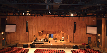 Seen from the upper balcony, the 1,700-seat New Barn combines a rustic interior look with modern production amenities.