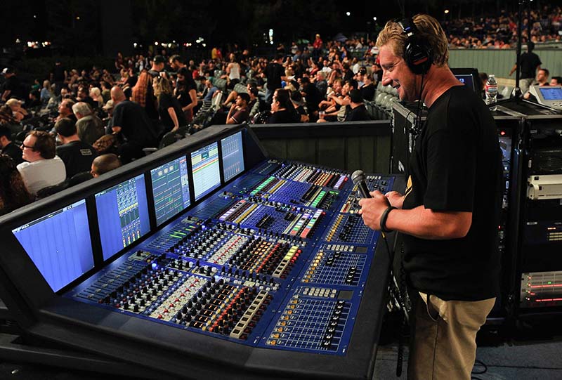 FOH mixer Antony King makes a final pre-flight check just before showtime at the Sleep Train Ampitheatre near Sacramento, CA. Photo by Steve Jennings