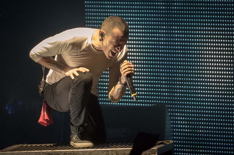 Linkin Park vocalist Chester Bennington often cups the mic when he sings. He also has a wide dynamic range. The capsule of choice is a Sennheiser 865. Photo by Vic Wagner