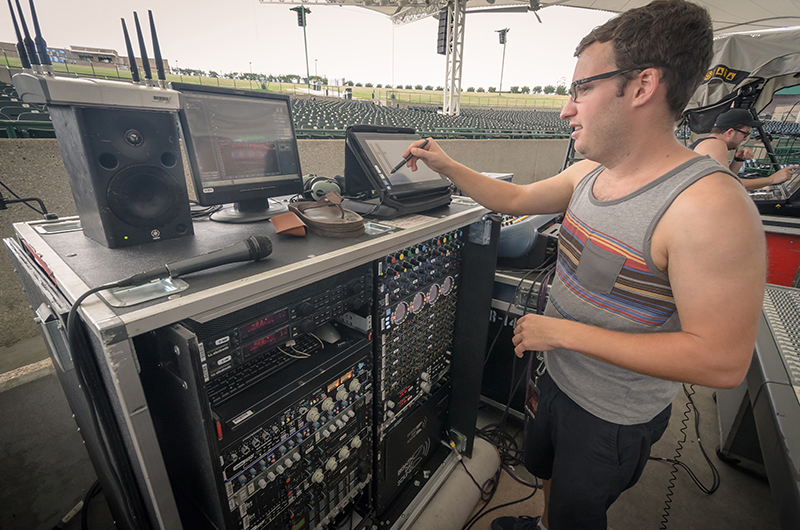 AFI/30 Seconds to Mars FOH mixer Jay Rigby runs a quick check-over before showtime. Photo by Vic Wagner