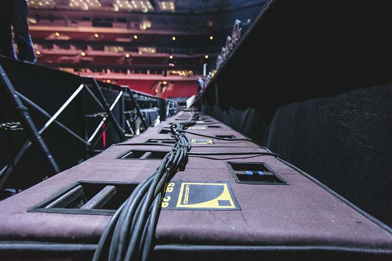 Along with the 12 L-Acoustics K1-SB subs flown adjacent to each of the main P.A. hangs, SB28 subs — 10 per side — were placed on-end in cardioid configuration under the stage deck.