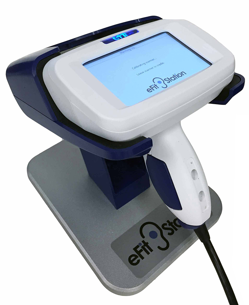 The laser scanning process is fast, accurate and non-invasive. An optical scanner (shown here in desk holster) is used to digitally capture ear impressions.