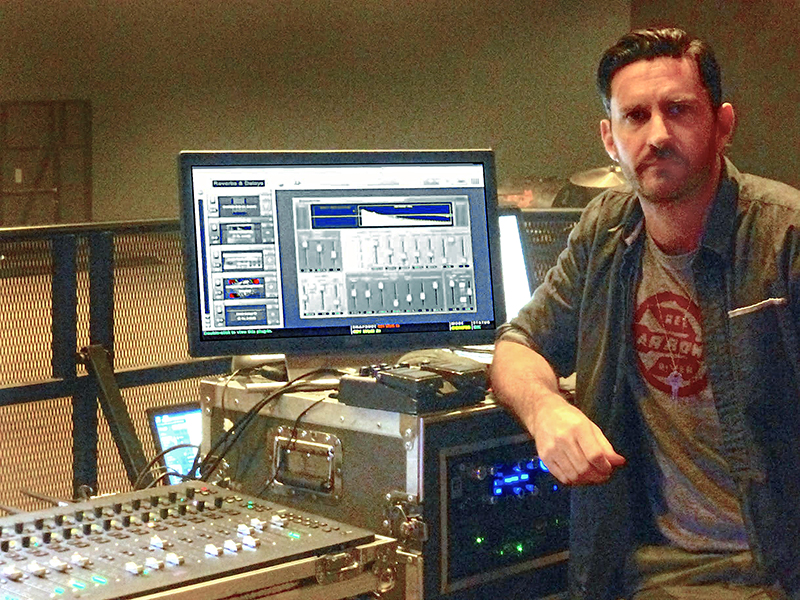 Andy Carrington with his Avid S3L mixer and conveniently at hand Roland SE-20 Space Echo pedal.