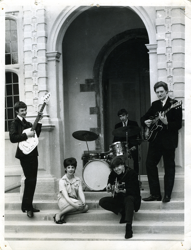 As a teen, Sheehan (in front of drums) played guitar in a band that performed around Europe