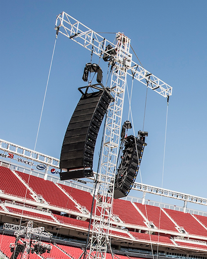 Detail of a delay tower with eight LYON speakers facing the stage for a rear surround feed and 12 MILO cabinets used for delay.