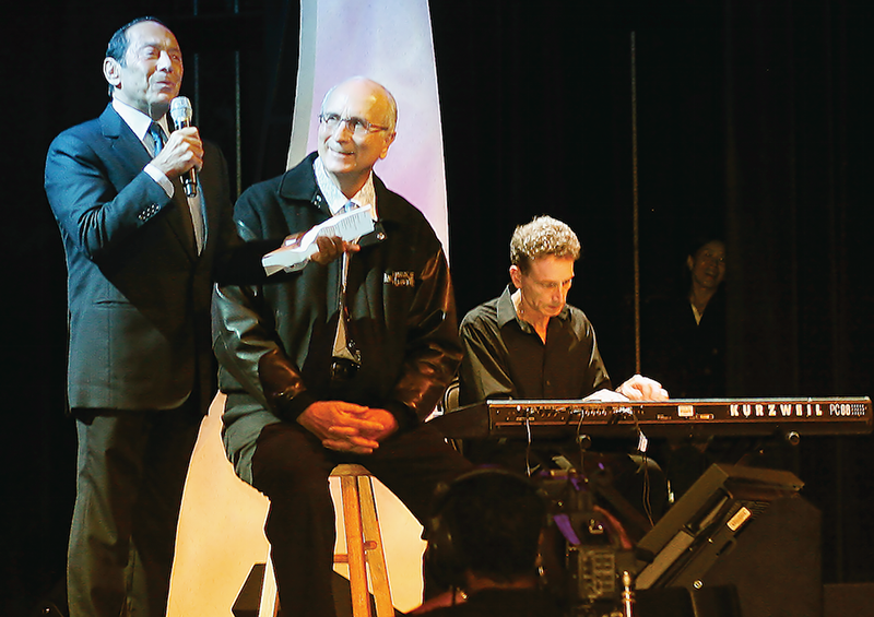 Paul Anka singing “My Way” to his original sound engineer, Al Siniscal, during the Parnelli Awards in 2010.