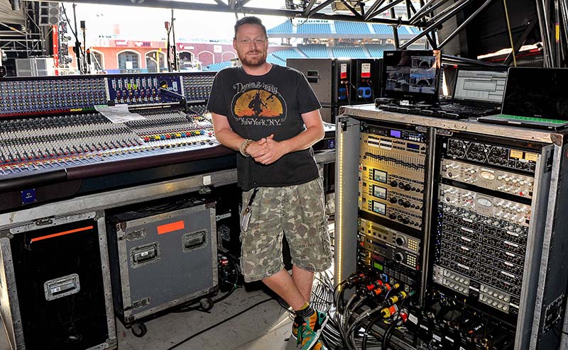 Monitor engineer Jon Lewis. Photo by Steve Jennings