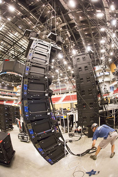 Dave Matthews Band 2015 European tour photo by Rene Huemer. A technician readies one of the Meyer hangs before flying.