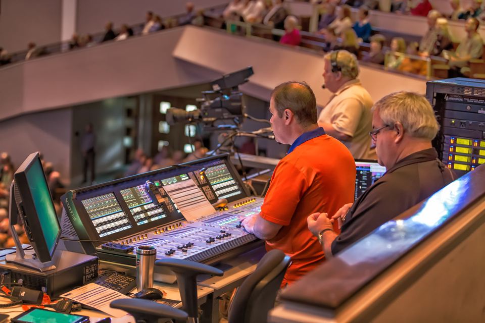 The FOH position features a Soundcraft Vi3000 console.