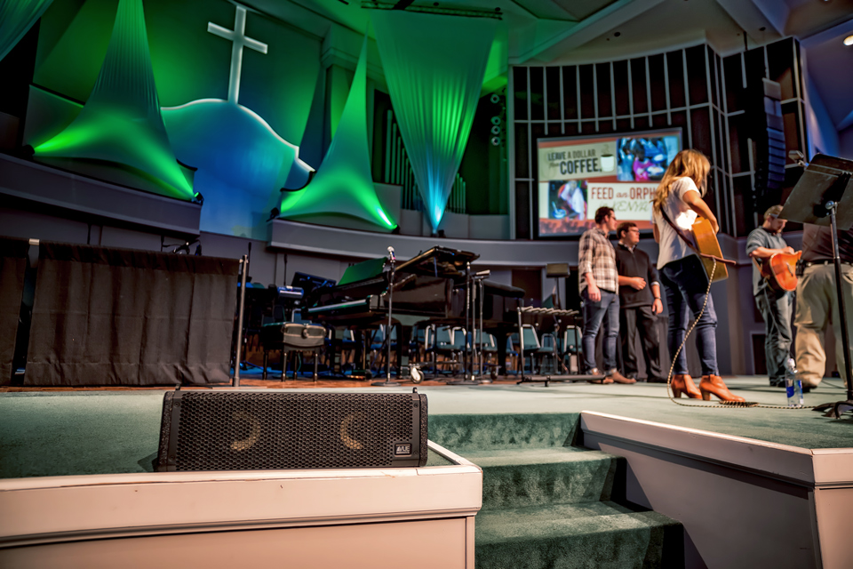 Rock and pop groups play during services aimed at a younger congregation. Visible in the foreground are VUE al-4s used as front fill.