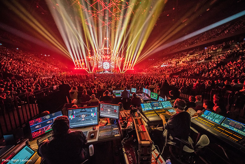 View from FOH, with lighting consoles in the foreground and audio engineers stationed farther in. Photo by Ralph Larmann