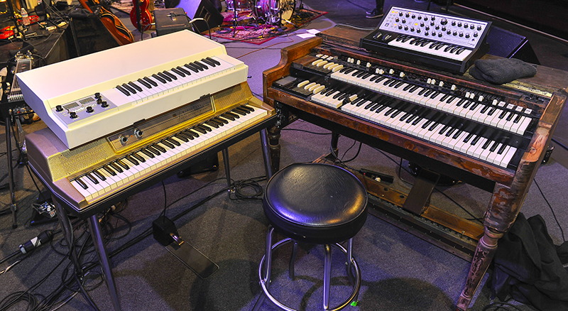 The somewhat-atypical country keyboard rig of a digital Mellotron, Wurlitzer piano, Moog Sub Phatty and a Hammond B3. Photo by Steve Jennings