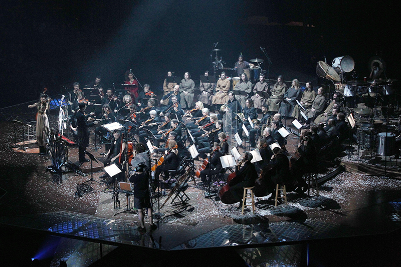 Layout of the players during an orchestral soundcheck. Note the plexi barriers between the horn and string sections.