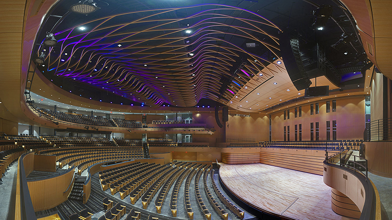 A wider view of the hall (with the choir seating retracted) gives a feeling for the venue’s wide expanse and elaborate ceiling detail. Photo by David Greenberg