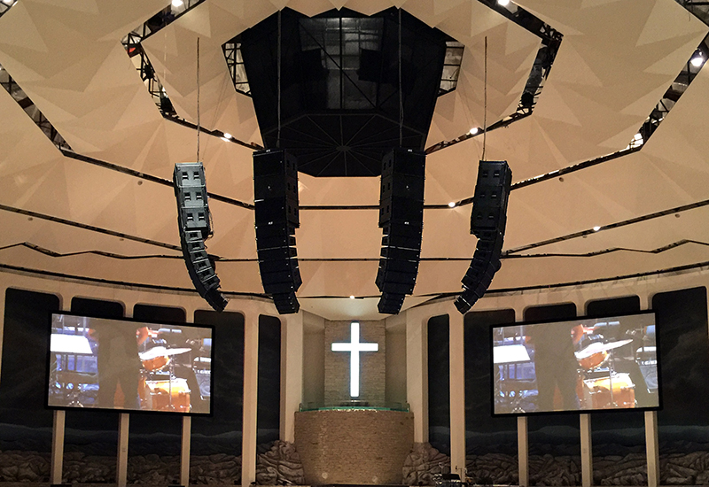 Detail of the sound system, which features four hangs of VUE line arrays with flown subs.