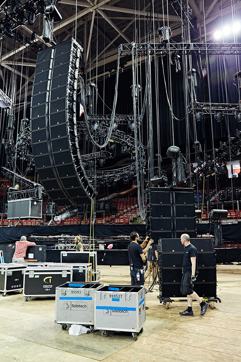 Ettienne Lapre of Solotech oversees SL midfill hang. The L-Acoustics K2 system covered the 19,000-capacity arena.