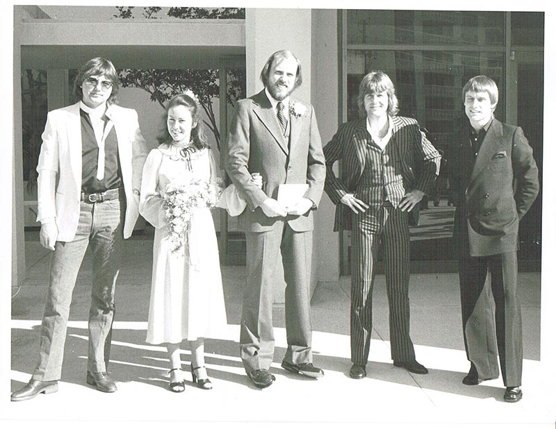 Boomer, center, with wife Susann and ELP band members.