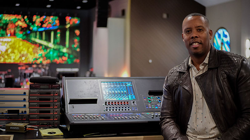 Nisan Stewart, senior pastor of Greater Emmanuel Temple Church in Lynwood, CA, pictured with the church’s Roland M-5000 OHRCA Live Mixing Console.