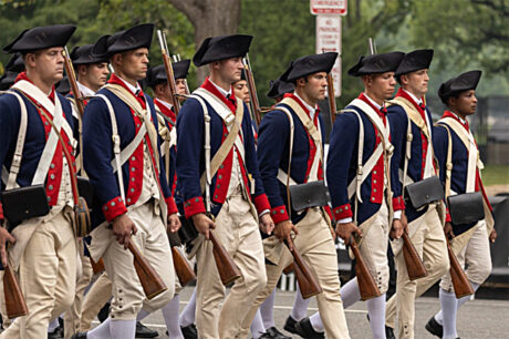 Soldiers from the Commander-in-Chief’s Guard, 3rd U.S. Infantry Regiment (The Old Guard), march in Revolutionary War-era uniforms during the Army’s 250th birthday parade in Washington, D.C. The historic unit honors the Army’s origins and showcases its enduring legacy of discipline and service. Photo: Army Staff Sgt. Rene Rosas