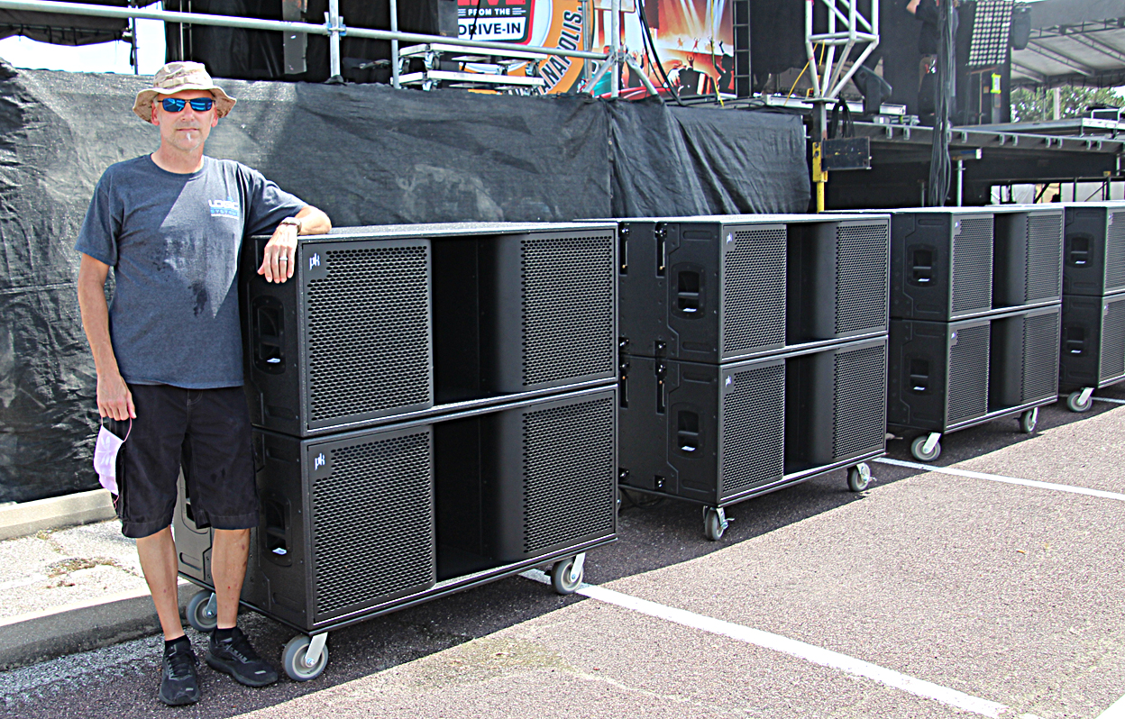 Logic Systems owner Chip Self with a few of the 30 PK Sound Gravity subs employed for the event. Photo: Kevin M. Mitchell