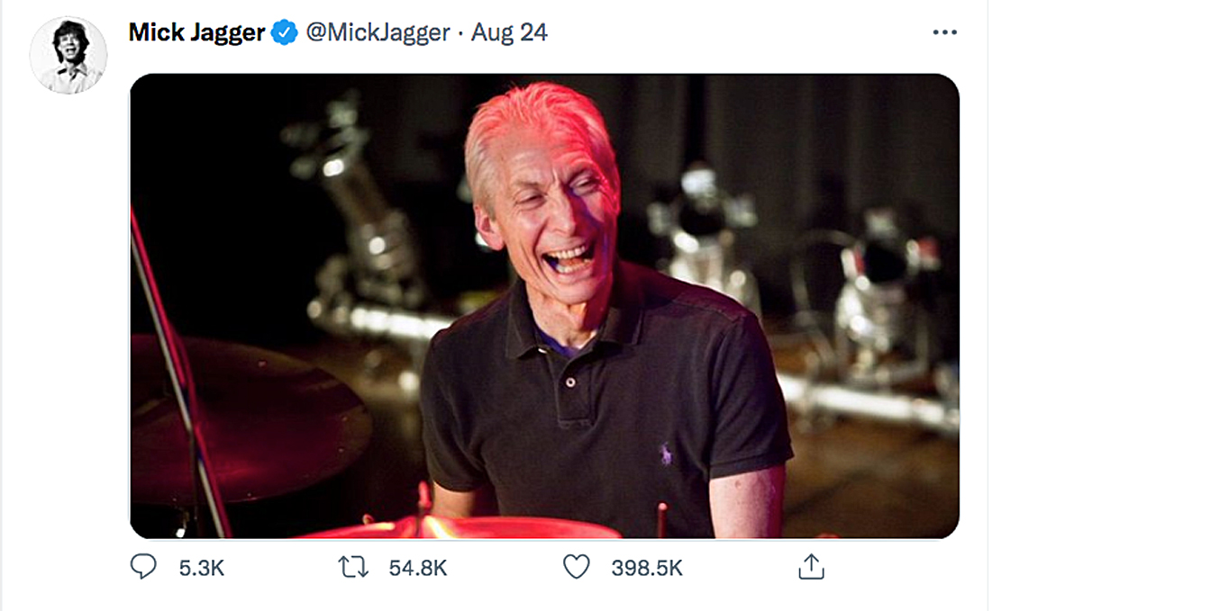 Mick Jagger posted this picture of Charlie as he probably would like to be remembered — with a huge smile. 
