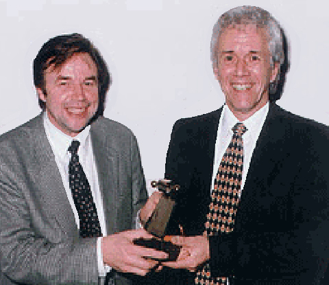 Ken Giles (left) presents the APRS Award to Ivor Drawmer