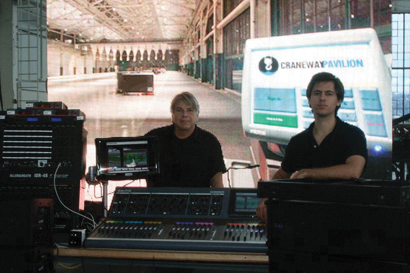 Photo caption: From left, John Griswold and system tech Lane Greenman