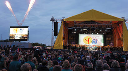 Victory Tour Production and AED Rent deployed a massive JBL VTX line array system for Jamboree Denmark 2012.