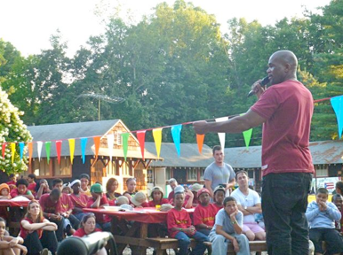 Darryl McDaniels of Run DMC communicates a message of inspiration to children attending Camp Felix.