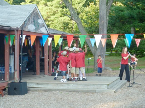 Performances at Camp Felix included Spanish dance routines; K-array KR 200s are visible at the left side of the photo.