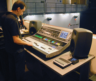 Mike Sartini, chief audio technician at Dean College, at the iLive console