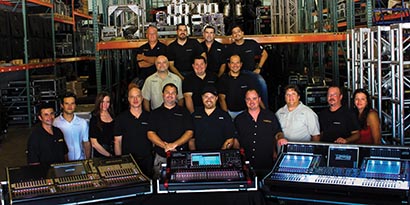 Beachsound Staff (Left to Right): Front Row: Troy Arabia, A1/FOH/Monitor Systems Engineer; Rafi Herrera, Lighting Assistant; Sarah Thornton, Administrative/Sales Assistant; David Thomas, Sales Manager; Matt Holden, A1/FOH, Monitor Systems Engineer; Andre Serafini, Owner; Bob Lidell, Account Executive; Chris Anderson, Sound & Lighting Technician; Stephanie Barcomb, Office Manager. Middle Row: Bill Blackstone, Pro Tools Certified Audio Engineer; David Gooch, Lighting Technician; Rodrego Herrera, A1/FOH, Monitor Systems Engineer. Top Row: Richard Neilson, Lighting Technician; Eric De’Moya, Lighting Technician; Joey Cucchiara, Warehouse Manager; Rafael Mojica, Lighting Designer.