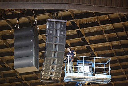 Colin Dekker stands by while test signals are sent to each cabinet. 