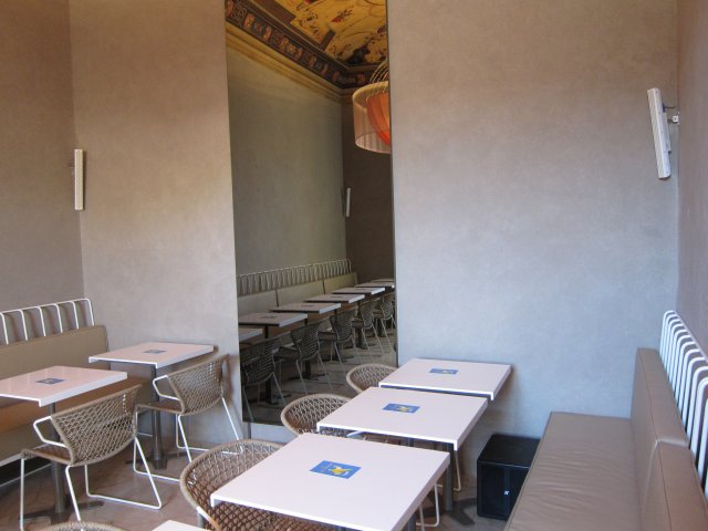 K-array installation at Rivalta Cafe in Florence, Italy. Speakers finished in white were chosen to blend in with the walls.