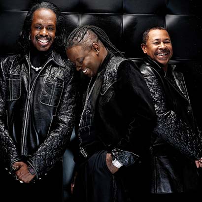 Verdine White, Philip Bailey and Ralph Johnson with Earth, Wind and Fire.