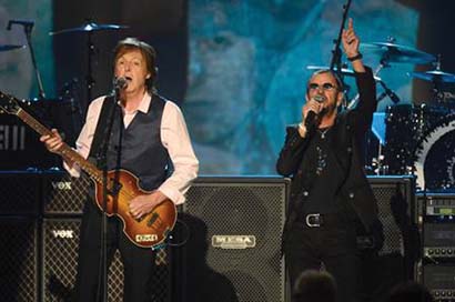 Paul McCartney and Ringo Starr perform onstage at 'The Night That Changed America: A GRAMMY Salute To The Beatles' at Los Angeles Convention Center on January 27, 2014 in Los Angeles, California. Photo by Kevin Mazur/WireImage.