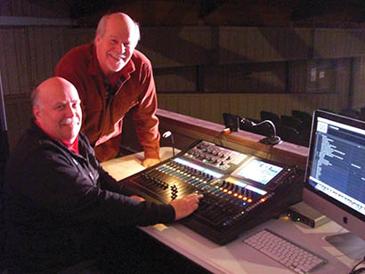 Old Log Theatre artistic director Kent Knutson (standing) worked with sound designer Jeff Geisler (seated) on an audio upgrade that included Allen & Heath’s GLD mixing console, Bose RoomMatch speakers and Shure ULX-D wireless microphones.