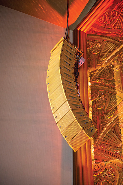 As part of the restoration for the art deco auditorium, the custom-painted gold loudspeaker arrays blend seamlessly into the gilt wood proscenium arch.