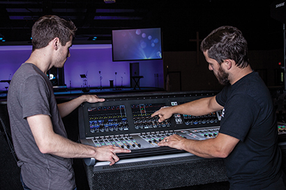 From left, Garret Kyler, Wesley United Methodist Church; and Chase Daigle, MSC Systems with the Soundcraft Vi3000 console.