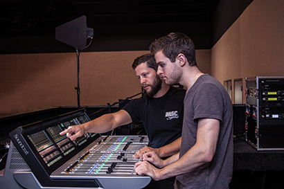 From left, Chase Daigle, MSC Systems, and Garret Kyler, Wesley United Methodist Church, with the Soundcraft Vi3000 console.