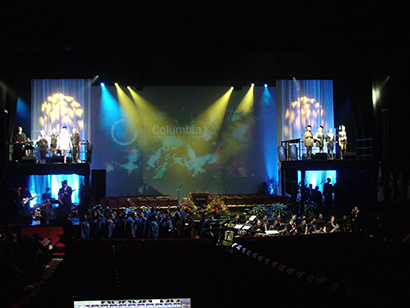 Because Columbia College Chicago specializes in arts and media, their commencement exercises in the Chicago Theatre and the outdoor arts festival showcase preceding it are characterized by a wide variety of musical styles, ensembles and performances.