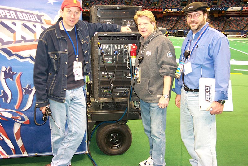 From left, Paul Liszewski, Michael Stahl and Scott Harmala at Super Bowl 2002