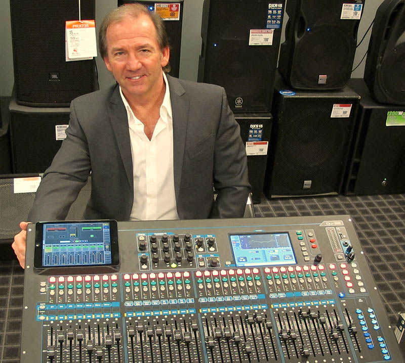 Guitar Center’s Bill Wrightson with one of the Allen & Heath Qu-32 mixing consoles.